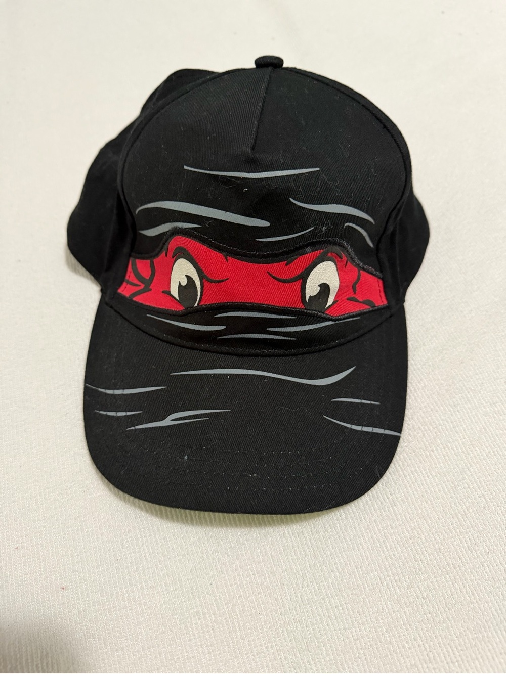 Kids Black Cap with Red Ninja Eyes Graphic